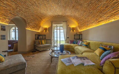 Battisole: Furniture, Interior Design, Wall, Ceiling, Flooring, Couch, Floor, Lighting, Room, Living Room