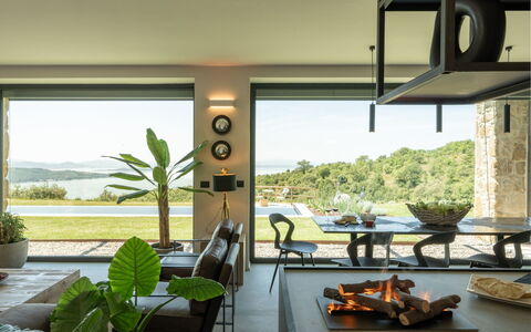 Villa Feronia: Furniture, Interior Design, Table, Lighting, Chair, Home, Light Fixture, Ceiling, Kitchen & Dining Room Table, Living Room