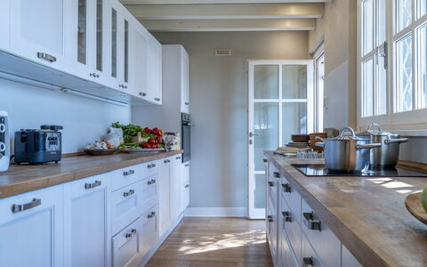 Bianca la Luna: Kitchen, Cabinetry, Countertop, Furniture, Kitchen Appliance, Interior Design, Wood, Flooring, Major Appliance, Drawer