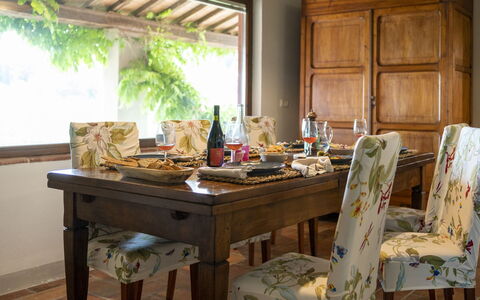 Villa delle Rose: Furniture, Interior Design, Table, Wood, Chair, Kitchen & Dining Room Table, Dining Room, Textile, Flooring, Tableware
