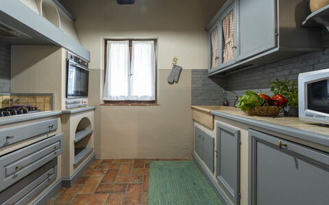 Villa delle Rose: Interior Design, Kitchen, Countertop, Cabinetry, Wood, Kitchen Appliance, Flooring, Furniture, Major Appliance, Home Appliance