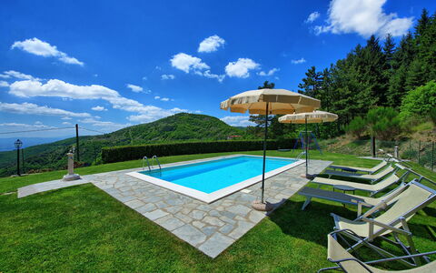 Villa Portole Due: Swimming Pool, Hill, Mountain Range, Hill Station, Resort, Leisure, Ridge, Eco Hotel, Outdoor Furniture, Valley
