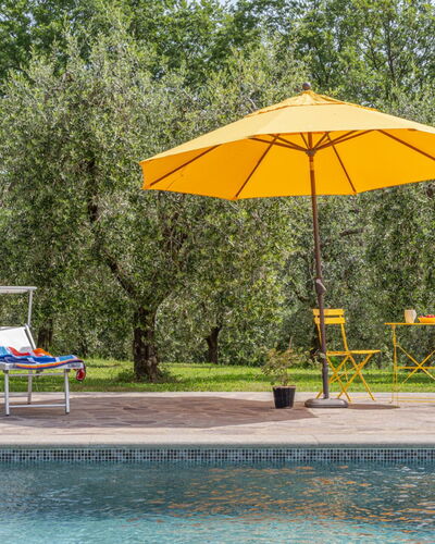 Il Querceto: Outdoor Furniture, Furniture, Umbrella, Swimming Pool, Shade, Chair, Garden, Resort, Sunlounger, Leisure