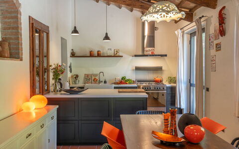 La Piccola Oasi: Furniture, Interior Design, Kitchen, Flooring, Wall, Light Fixture, Countertop, Ceiling, Wood, Kitchen Appliance