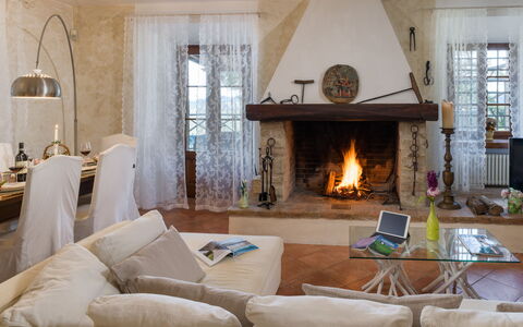 Capanna Al Lago: Furniture, Interior Design, Flooring, Wood, Floor, Room, Living Room, Lighting, Ceiling, Hearth