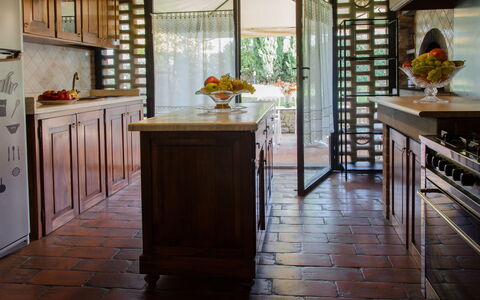 Dimora Di Castroncello: Furniture, Flooring, Interior Design, Floor, Wood, Lighting, Countertop, Room, Wood Stain, Kitchen