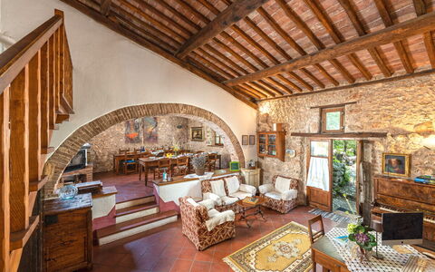 Podere Lorena, Charming Tuscan Farmhouse: Furniture, Wall, Interior Design, Chair, Home, Flooring, Table, Ceiling, Stone Wall, Living Room