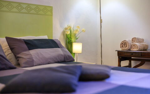 The Silent Courtyard Retreat: Spacious 2-Bedroom S: Bed, Furniture, Bedroom, Bedding, Interior Design, Bed Sheet, Linens, Room, Floor, Textile