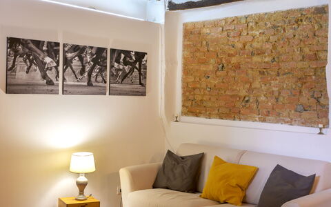 The Silent Courtyard Retreat: Spacious 2-Bedroom S: Wall, Interior Design, Furniture, Flooring, Room, Home, Floor, Living Room, Lighting, Couch