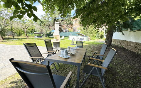 Il Volo Del Nibbio: Furniture, Chair, Outdoor Furniture, Table, Outdoor Table, Kitchen & Dining Room Table, Shade, Restaurant, Garden, Patio