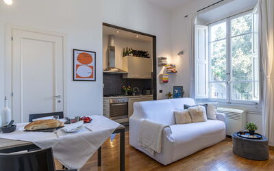 Green Suite Florence: Furniture, Interior Design, Flooring, Room, Table, Couch, Floor, Ceiling, Living Room, Chair