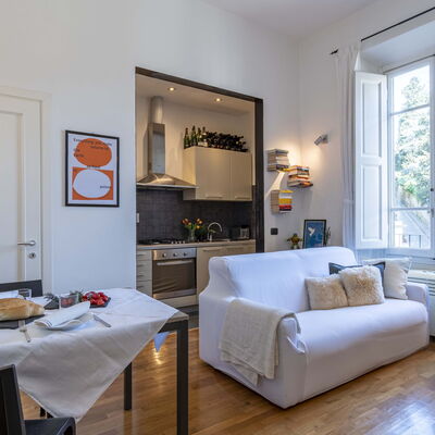 Green Suite Florence: Furniture, Interior Design, Flooring, Room, Table, Couch, Floor, Ceiling, Living Room, Chair