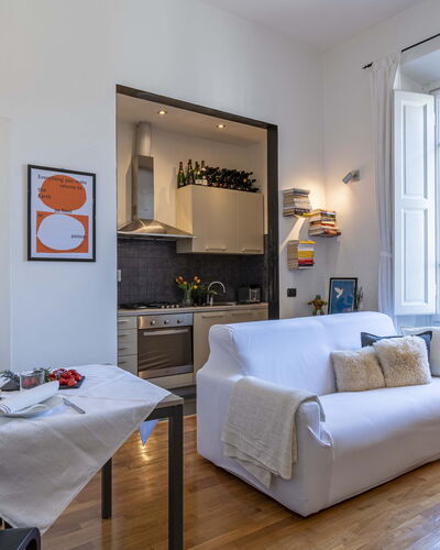 Green Suite Florence: Furniture, Interior Design, Flooring, Room, Table, Couch, Floor, Ceiling, Living Room, Chair