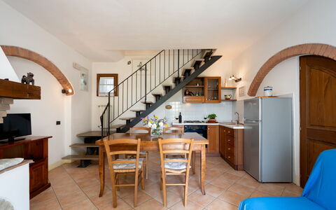 Casa Livia: Furniture, Interior Design, Kitchen, Chair, Apartment, Houseplant, Countertop, Kitchen & Dining Room Table, Wood Stain, Cabinetry