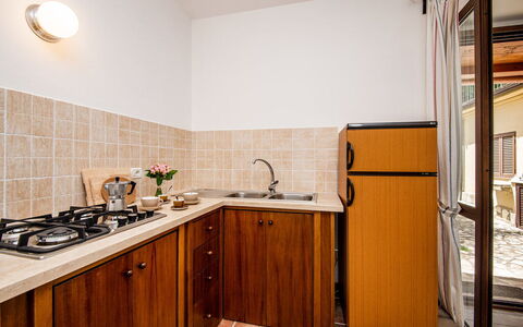 Casa Alloro, Ac, Wifi, Narni: Wood, Kitchen, Countertop, Major Appliance, Interior Design, Kitchen Appliance, Kitchen Sink, Cabinetry, Wood Stain, Sink