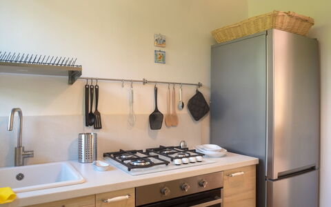 Casa Carla: Kitchen Appliance, Kitchen, Countertop, Major Appliance, Kitchen Stove, Stove, Home Appliance, Gas Stove, Cabinetry, Furniture