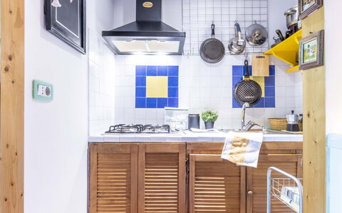 Suite Vogel: Kitchen, Major Appliance, Kitchen Appliance, Wood, Flooring, Furniture, Interior Design, Countertop, Floor, Cabinetry