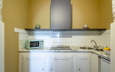 Passignano: Kitchen, Countertop, Kitchen Appliance, Interior Design, Major Appliance, Flooring, Cabinetry, Furniture, Floor, Ceiling