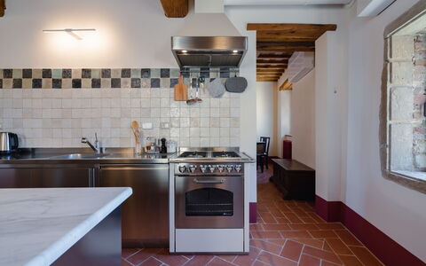 Mensano Old Town Apartment: Flooring, Kitchen, Wall, Interior Design, Floor, Wood, Countertop, Ceiling, Kitchen Appliance, Kitchen Stove