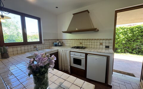 Dependance Egle: Wood, Flooring, Kitchen, Interior Design, Floor, Furniture, Countertop, Kitchen Appliance, Tile, Kitchen & Dining Room Table