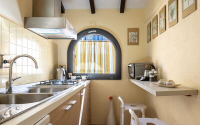 Cottage: Interior Design, Kitchen, Countertop, Kitchen Appliance, Major Appliance, Home, Floor, Room, Ceiling, Home Appliance