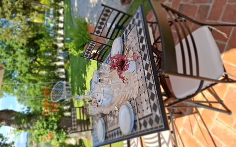 The Tuscan Retreat Spa: Furniture, Chair, Table, Outdoor Table, Outdoor Furniture, Iron, Garden, Yard, Shade, Lawn