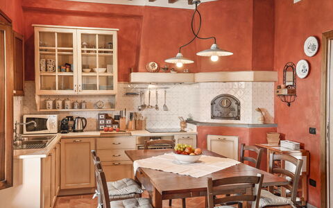 Villa Costa al Bagno: Furniture, Interior Design, Flooring, Kitchen, Cabinetry, Floor, Wood, Chair, Ceiling, Room