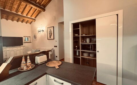 Casa Castelli: Interior Design, Flooring, Furniture, Wood, Ceiling, Countertop, Cabinetry, Kitchen, Floor, Lighting