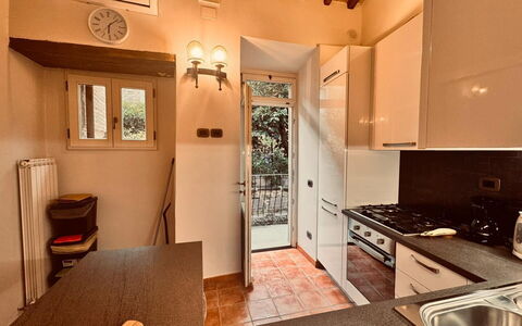 Casa Castelli: Kitchen, Kitchen Appliance, Major Appliance, Countertop, Flooring, Interior Design, Wood, Floor, Ceiling, Home Appliance