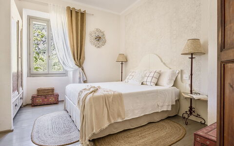 Villa Chiovada: Furniture, Bed, Interior Design, Bedroom, Wall, Bedding, Bed Sheet, Wood, Floor, Room