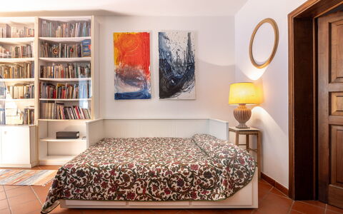 Il Ferrone Apartment with Garden - Greve in Chiant: Furniture, Interior Design, Wall, Flooring, Floor, Room, Bedroom, Wood, Bed, Textile