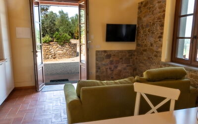 Marina's Lodge: Wall, Furniture, Flooring, Interior Design, Floor, Table, Room, Chair, Living Room, Ceiling