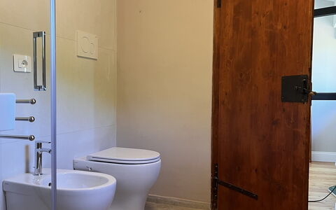 Villa Vindelbono: Wood, Flooring, Floor, Plumbing Fixture, Brown, Door, Plumbing, Bathroom, Wood Stain