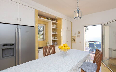 La Terrazza sul Mare: Furniture, Flooring, Interior Design, Wood, Floor, Ceiling, Kitchen, Kitchen & Dining Room Table, Dining Room, Chair