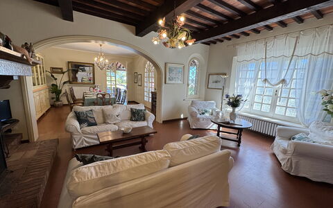 Casa Mia: Furniture, Interior Design, Couch, Flooring, Ceiling, Wood, Floor, Living Room, Table, Room