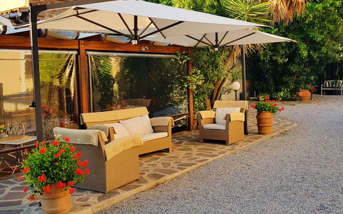 Appartamento Papavero Seaside and Pool: Furniture, Flowerpot, Outdoor Furniture, Shade, Umbrella, Chair, Outdoor Table, Garden, Outdoor Structure