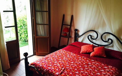 Appartamento Papavero Seaside and Pool: Bed, Bedroom, Furniture, Bedding, Bed Sheet, Wood, Linens, Interior Design, Textile, Floor