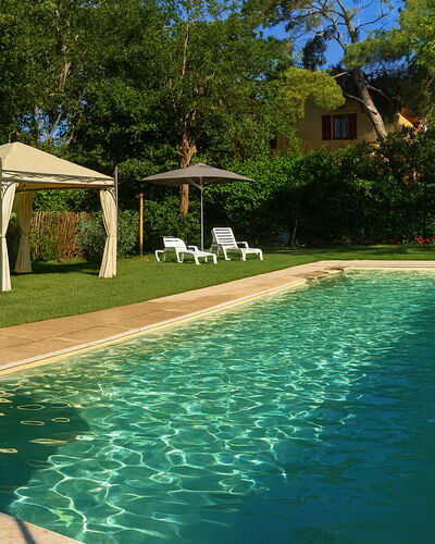 Appartamento Papavero Seaside and Pool: Swimming Pool, Resort, Shade, Backyard, Garden, Eco Hotel, Leisure, Landscaping, Hacienda, Water Feature
