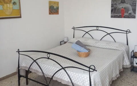 La Torre sul Ponte, Seaview, Garden: Bed, Bedroom, Floor, Bedding, Flooring, Bed Frame, Furniture, Bed Sheet, Interior Design, Room