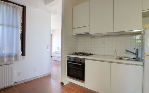 Montparnasse: Kitchen Appliance, Kitchen, Flooring, Countertop, Major Appliance, Interior Design, Floor, Wood, Cabinetry, Room