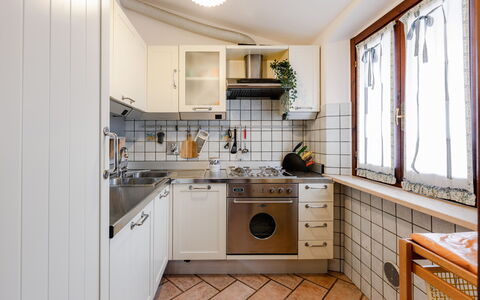 Casa Miramonti: Kitchen, Kitchen Appliance, Countertop, Major Appliance, Interior Design, Flooring, Cabinetry, Wood, Kitchen Sink, Floor