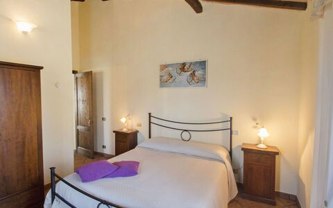 Podere Peteglia: Furniture, Flooring, Floor, Interior Design, Home, Ceiling, Room, Bed Frame, Bed, Bedroom