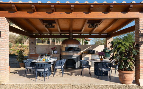 Villa Elisa: Furniture, Table, Outdoor Furniture, Chair, Outdoor Table, Outdoor Structure, Patio, Shade, Flowerpot, Garden