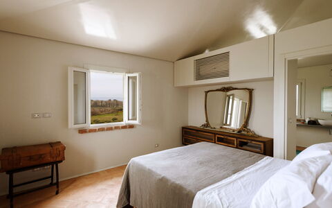 Villa Dedalo: Bed, Bedroom, Wall, Interior Design, Furniture, Wood, Bed Sheet, Ceiling, Bedding, Floor