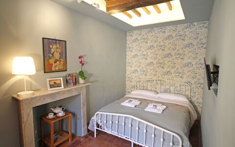 La Casa sulla Piazza: Furniture, Interior Design, Wall, Wood, Bedroom, Floor, Flooring, Ceiling, Bed, Room