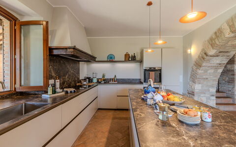 Casale Nido: Kitchen, Countertop, Interior Design, Flooring, Wood, Ceiling, Kitchen Appliance, Lighting, Furniture, Cabinetry