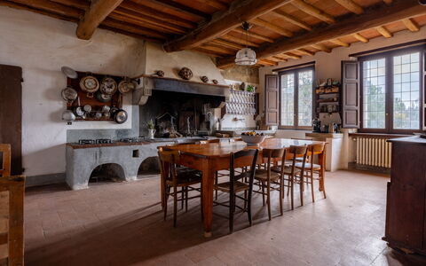 Villa Il Casalino, Florentine Hills with Pool: Furniture, Wood, Kitchen, Home, Cabinetry, Chair, Countertop, Stove, Kitchen & Dining Room Table, Wood Stain