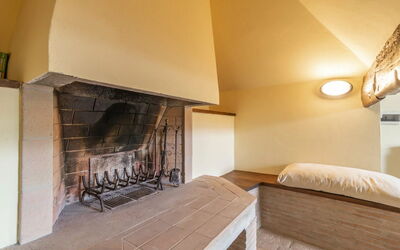 Strettoio: Interior Design, Flooring, Ceiling, Wood, Floor, Furniture, Room, Lighting, Hearth, Living Room