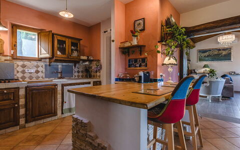 Villa dei Fiori: Furniture, Interior Design, Flooring, Kitchen, Countertop, Wood, Floor, Cabinetry, Ceiling, Room