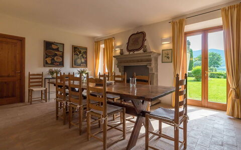 Villa Molinazzo 14: Furniture, Flooring, Table, Wood, Interior Design, Floor, Kitchen & Dining Room Table, Chair, Room, Dining Room